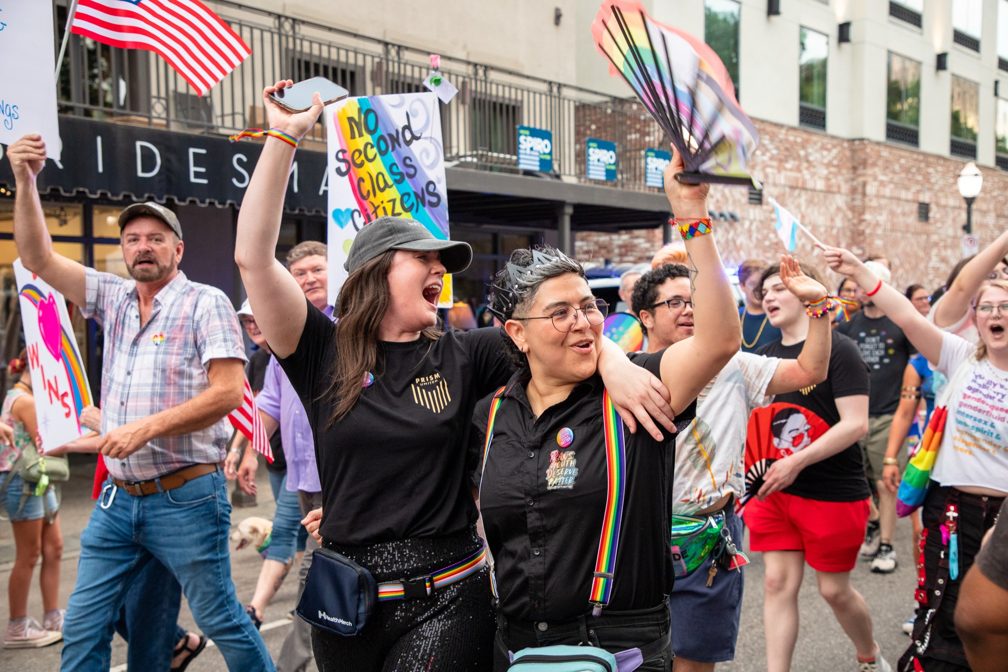 Marchers celebrate at the pride art walk downtown